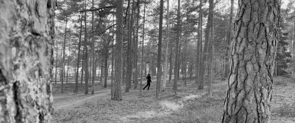 The Soldier – still, running through the forest